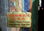 Sign hanging on the front door of the Potala Palace