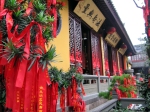 Red cloth tied to the lattice of the Jade Buddha Temple doors in Shanghai, China